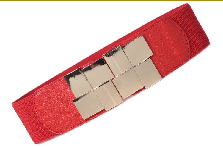 The lady's loose skirt has a wide belt